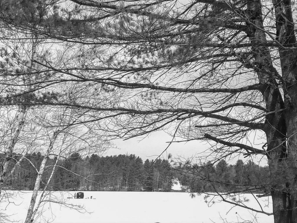 Someone ice fishing in Norway, Maine. 